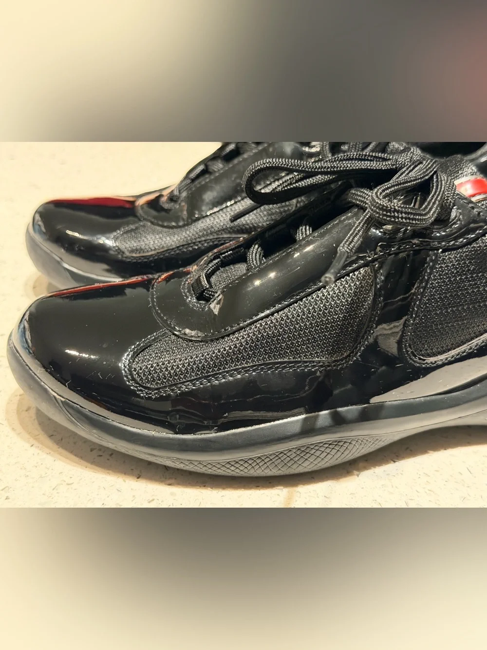 Prada America Cup Black patent leather Athletic Sneakers with Red Accent